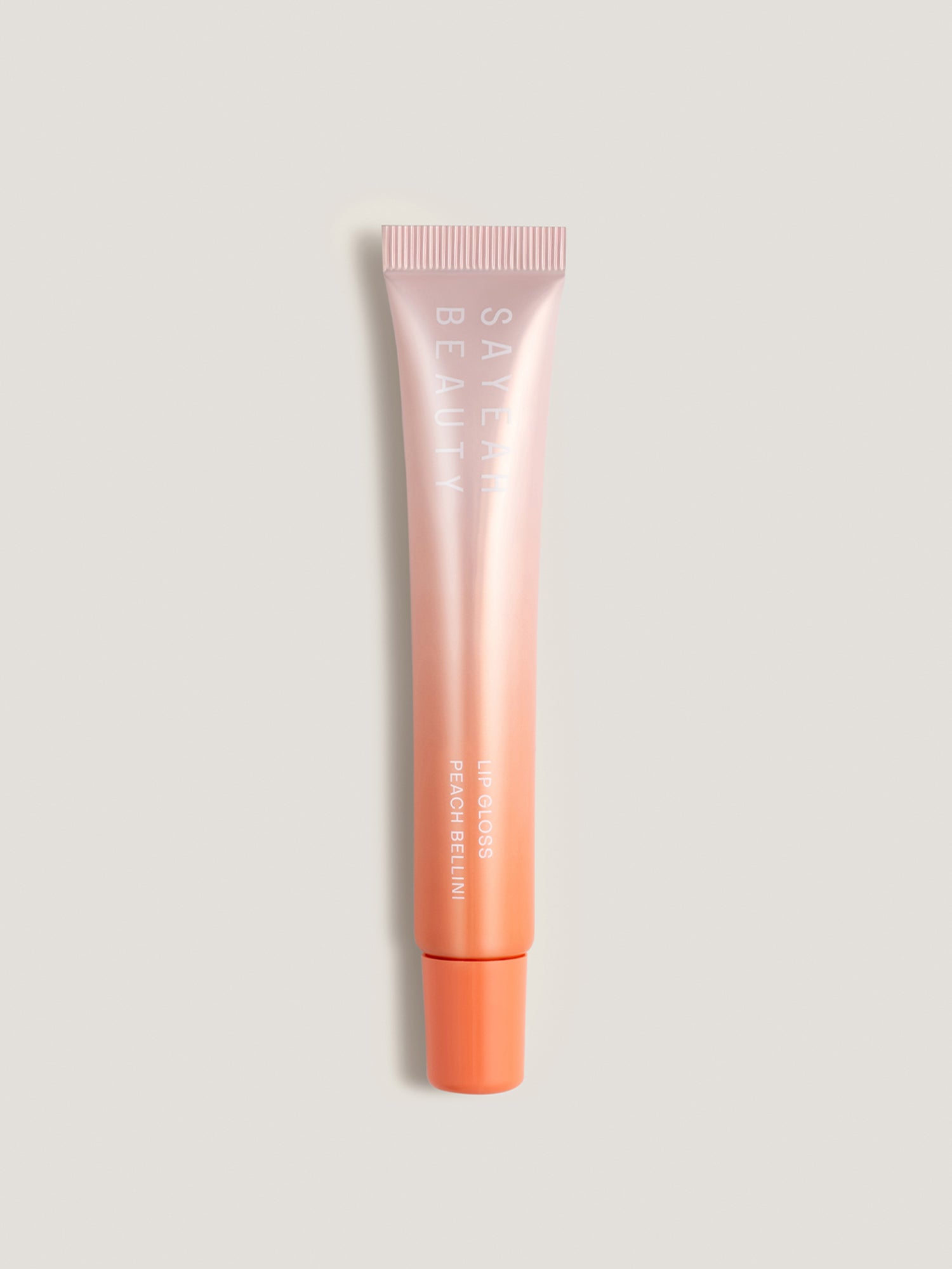 CBD LIP GLOSS — PEACH BELLINI
