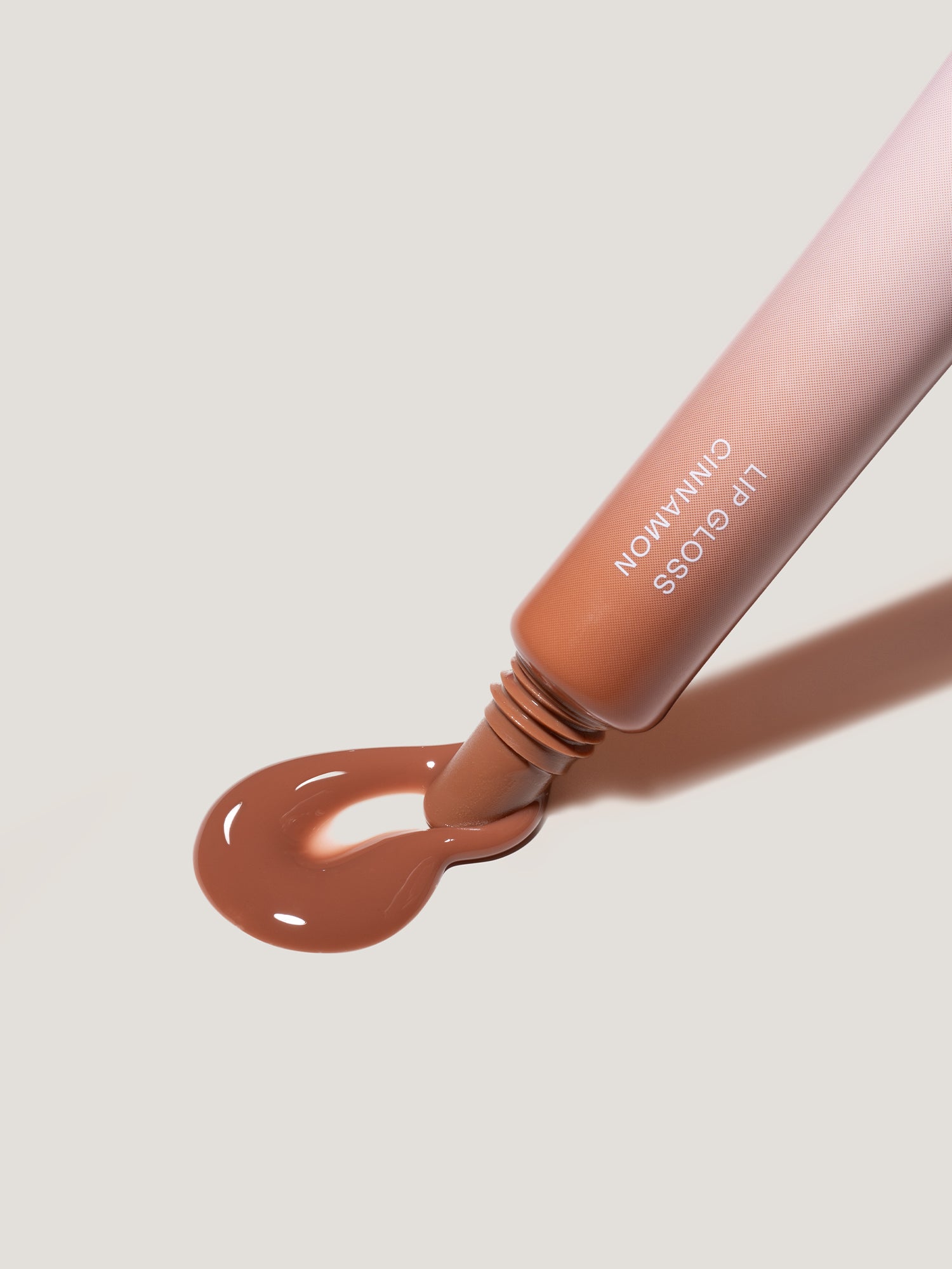 CBD LIP GLOSS — CINNAMON