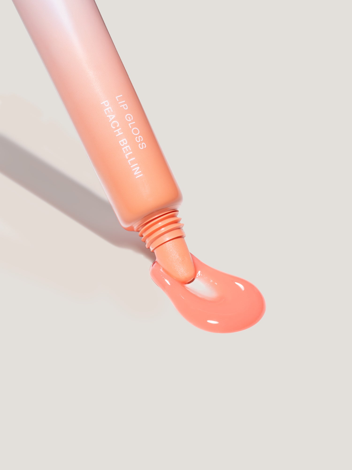 CBD LIP GLOSS — PEACH BELLINI